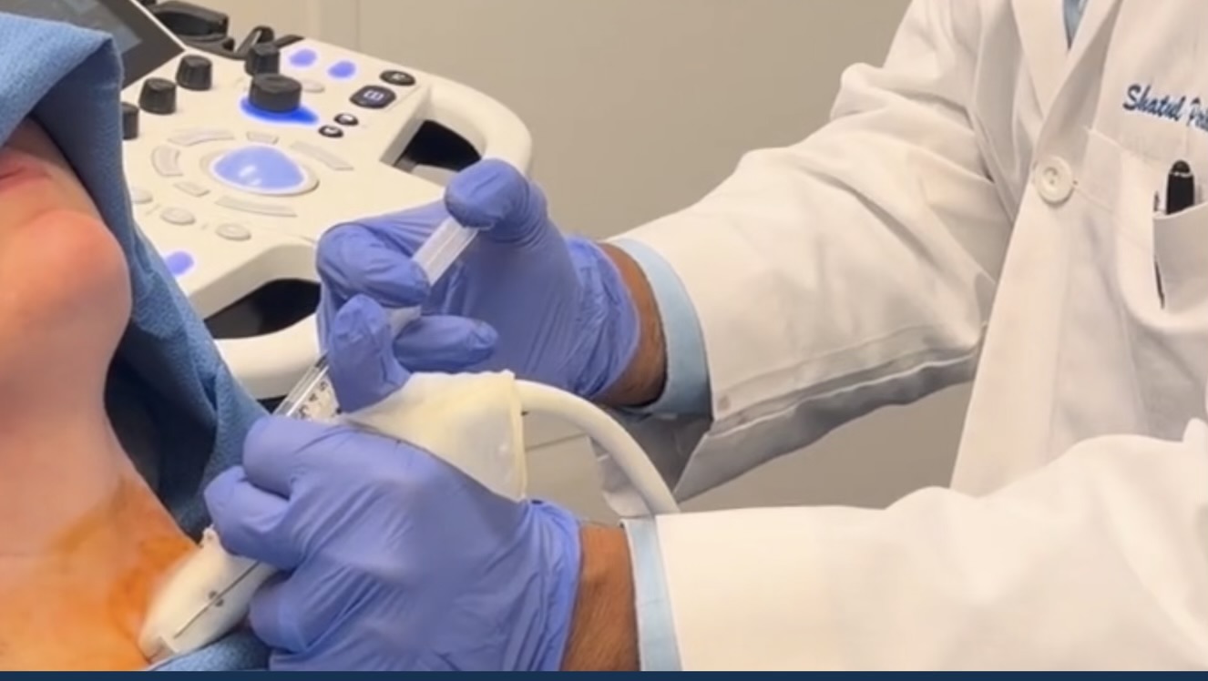 Dr. Parikh performing ultrasound-guided thyroid biopsy